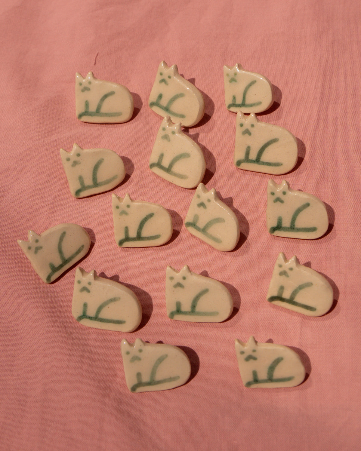 Left-Facing Cat Badge