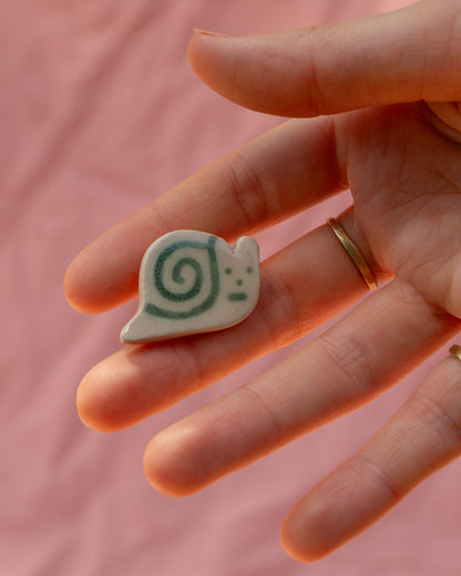 :-I Snail Badge