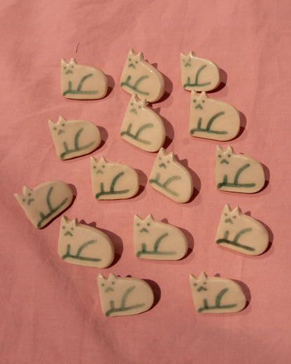 Left-Facing Cat Badge