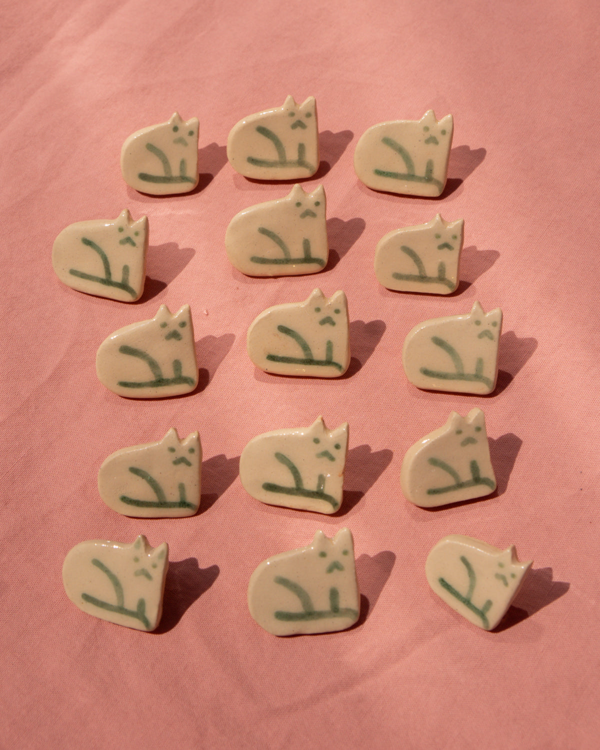Right-Facing Cat Badge