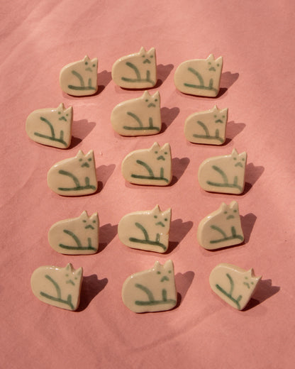 Right-Facing Cat Badge
